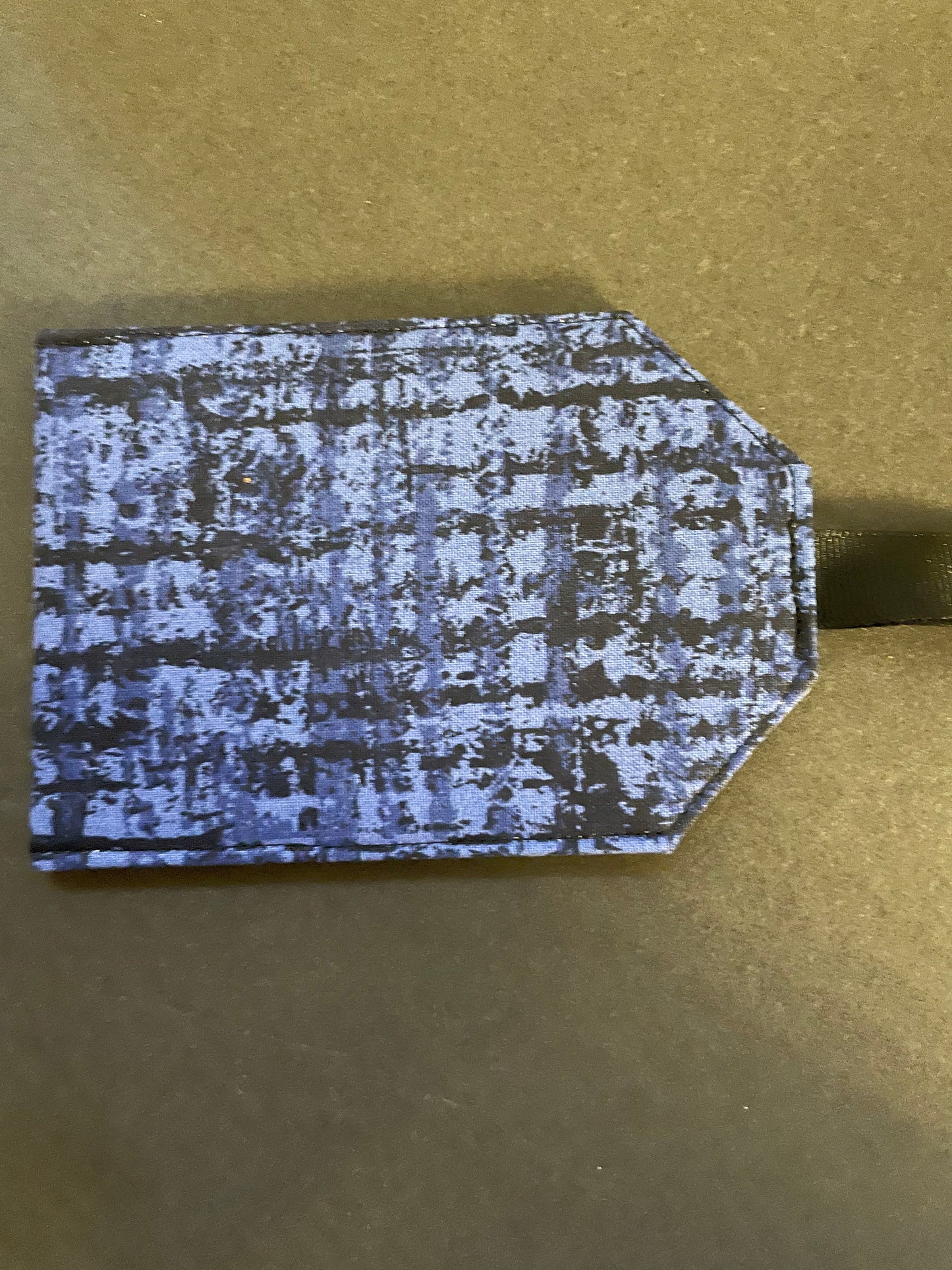 Blue and Black Luggage Tag