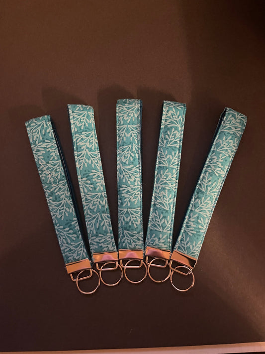 Teal Floral/leafy Wristlet