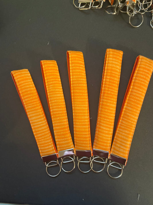 Orange Striped Wristlet