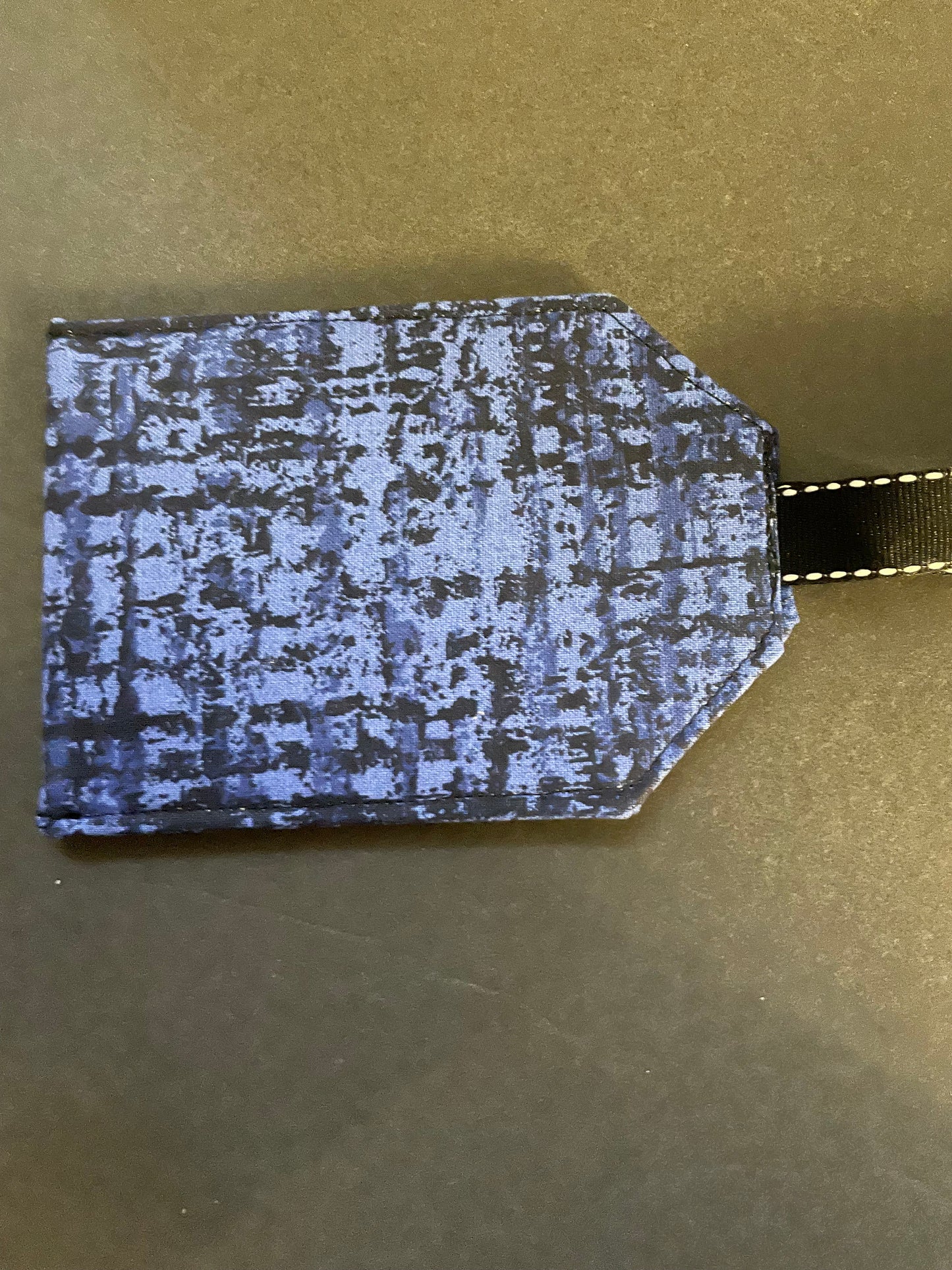 Blue and Black Luggage Tag