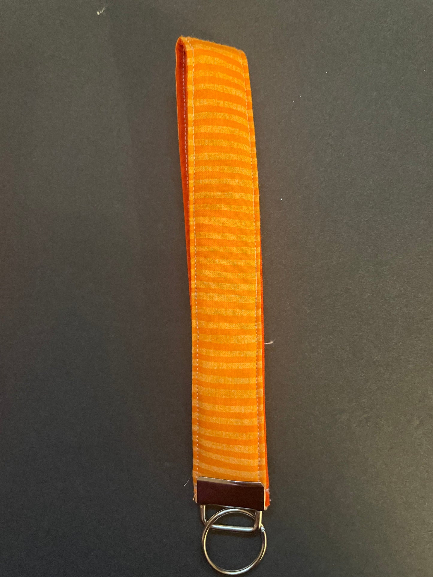 Orange Striped Wristlet