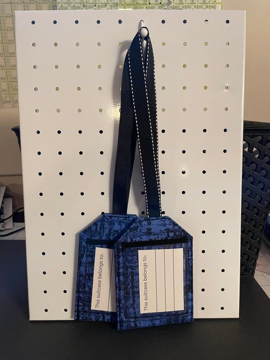 Blue and Black Luggage Tag